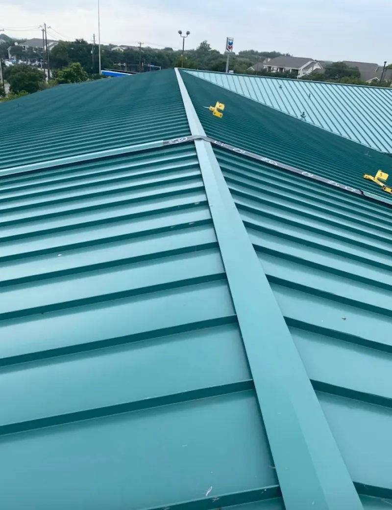 Green commercial metal roof ridge and valley for Metal Roof Repair in Savannah